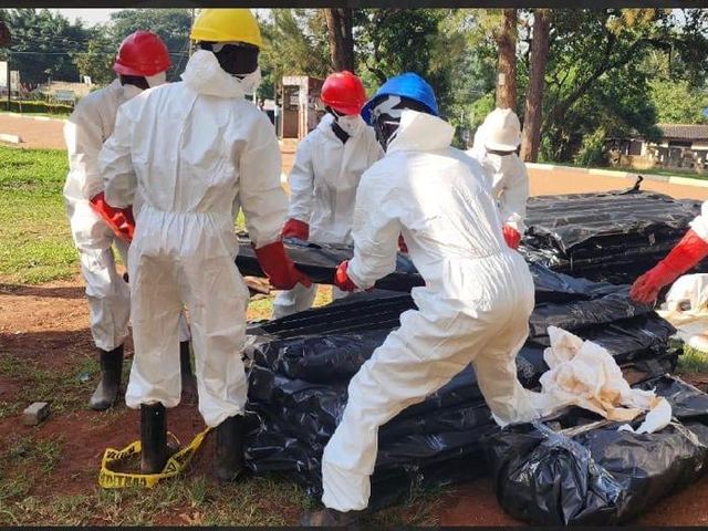 Bagging contaminated material for safe removal