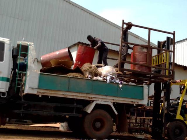 Loading industrial waste for transport