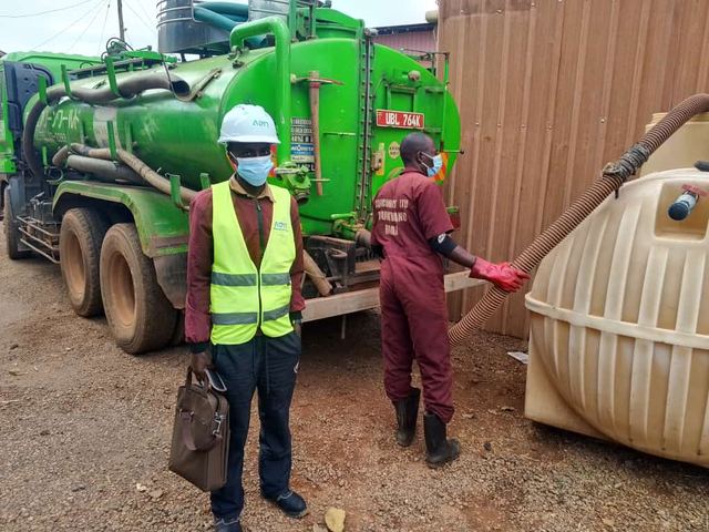 Vacuum tanker extracting liquid waste